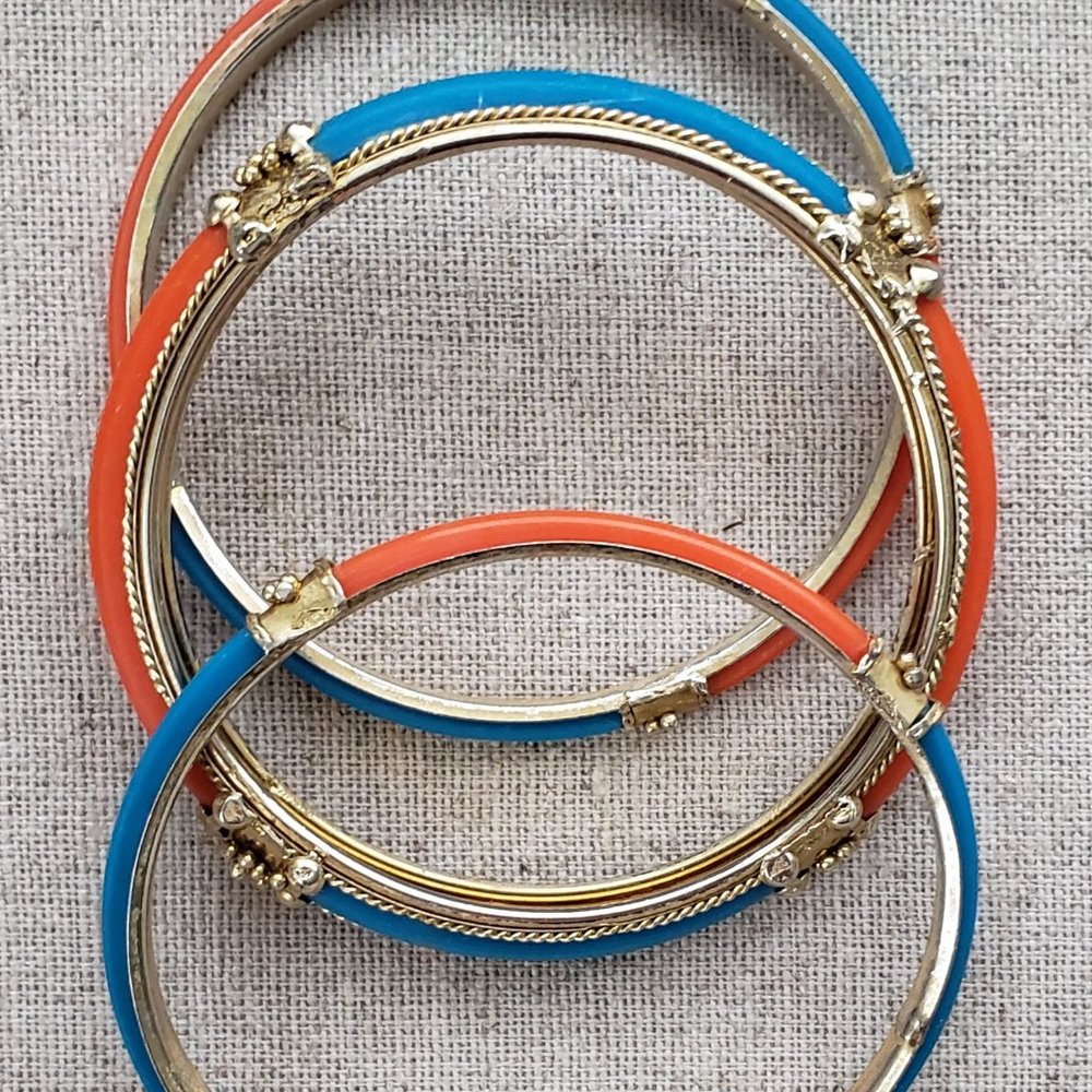 Vibrant Blue and Orange Bangles with Gold Accents